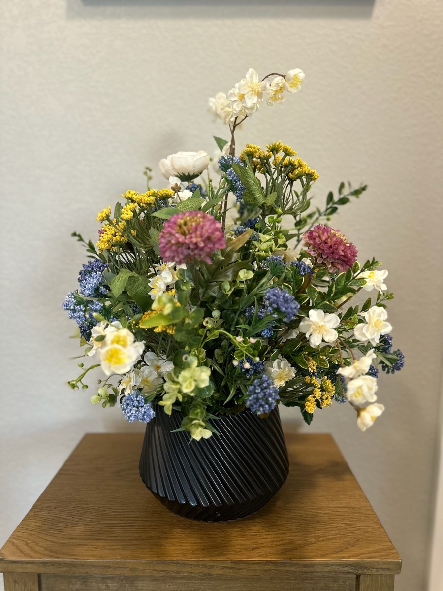 Faux flower arrangement by Schwick&rsquo;s Picks