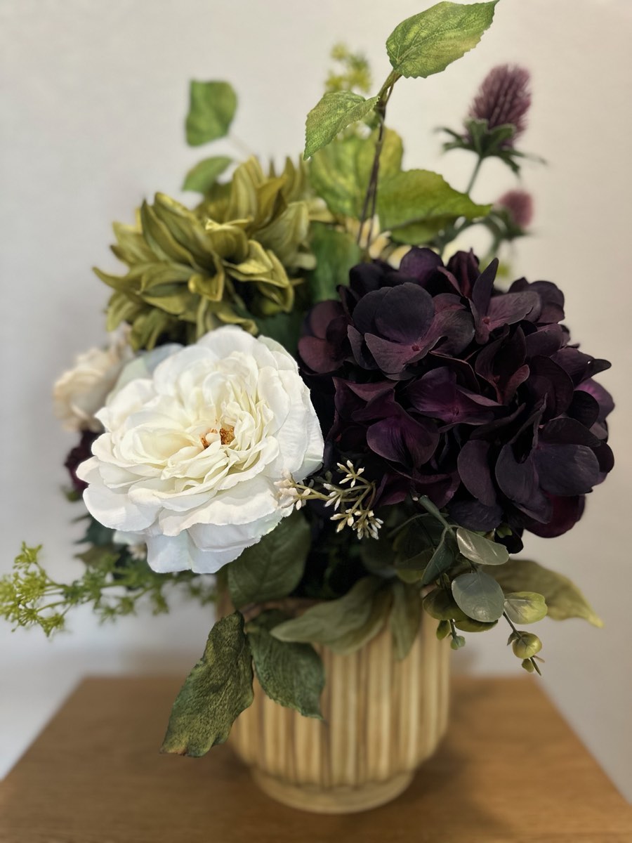 Faux flower arrangement by Schwick&rsquo;s Picks